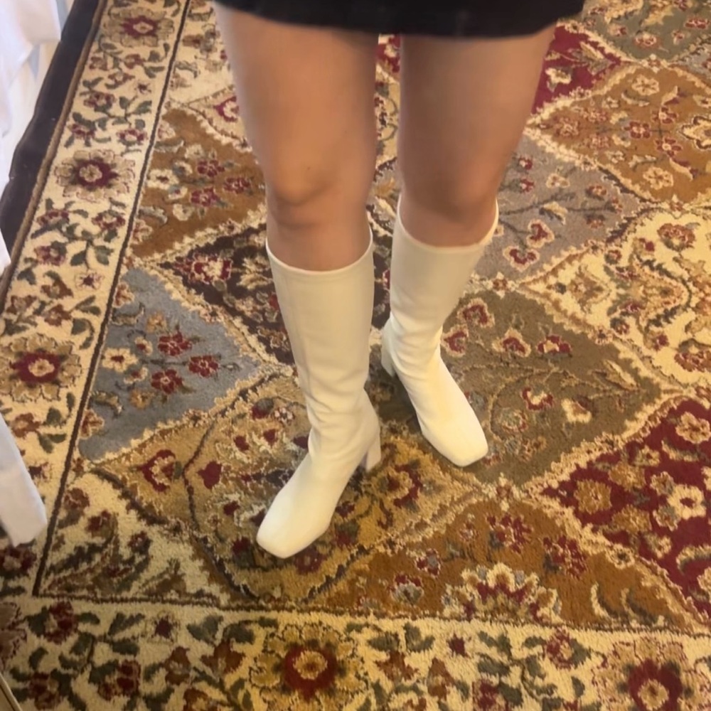 Knee height heeled white faux leather boots